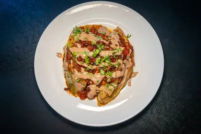 Buttery Charred Cabbage in Spiced Tomatoes with Tahini